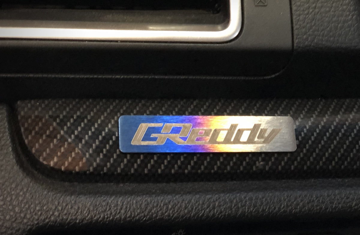 Titanium GReddy Emblem - (70x15mm)